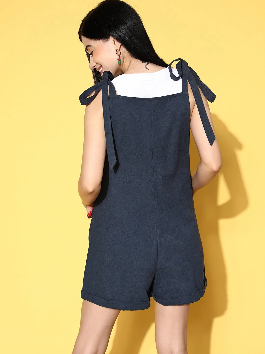 Berrylush Women Solid Navy Blue Square Neck Front Two-Pocket Tie-Up Strap Cotton Mini Jumpsuit